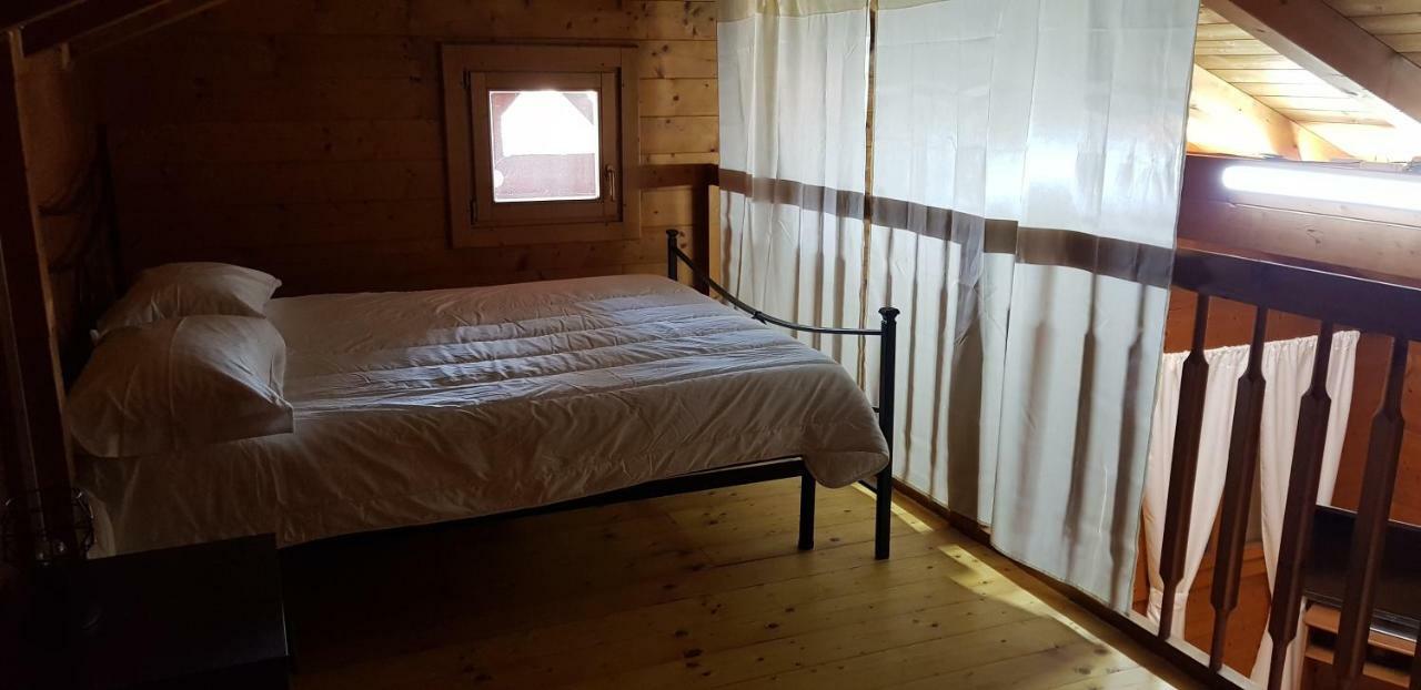 Chalet L Oasi Di Ambra 8 Posti Letto Con Uso Piscina Ardea Bagian luar foto